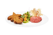 Beef steak tartare flavored with truffle oil and Kikkoman soy sauce / 2 halves toast /
