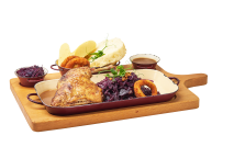 Confit of duck leg with cabbage seasoned with cranberries and homemade bread dumplings