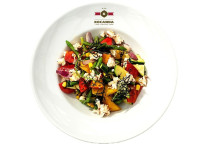 Roasted vegetables with fresh herbs and farm cheese